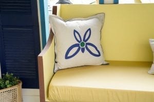 Shed detail: Edge of couch with throw pillow.
